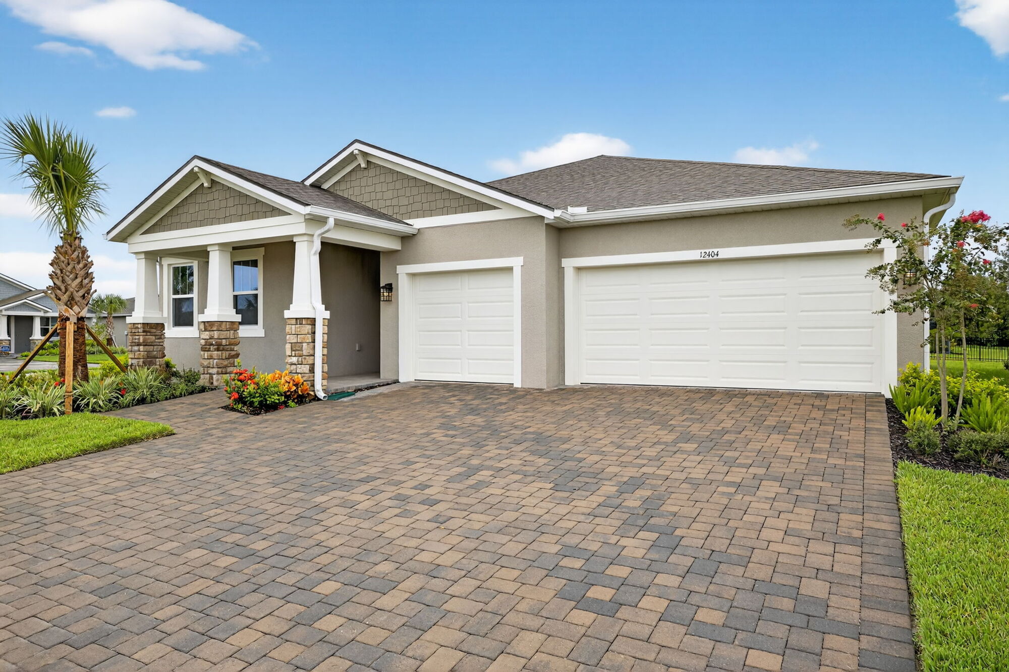  Elevation Front with garage, window and stone flooring