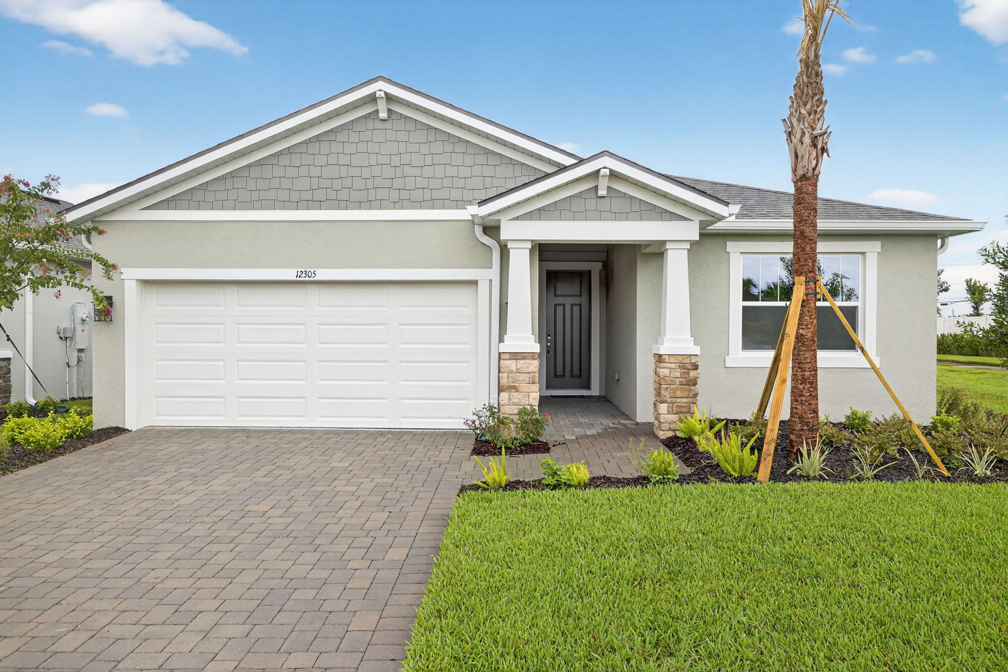  Elevation Front with garage, door and window