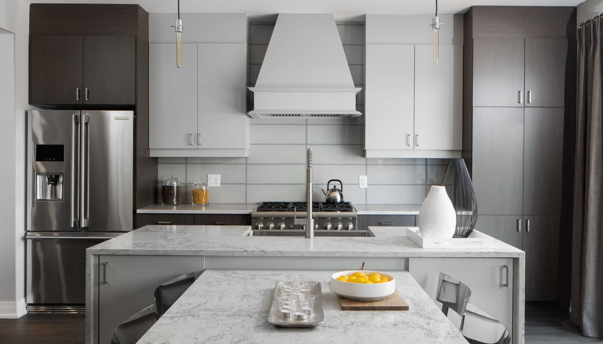 Single-Wall Kitchen with kitchen island, refrigerator, curtains, white cabinets