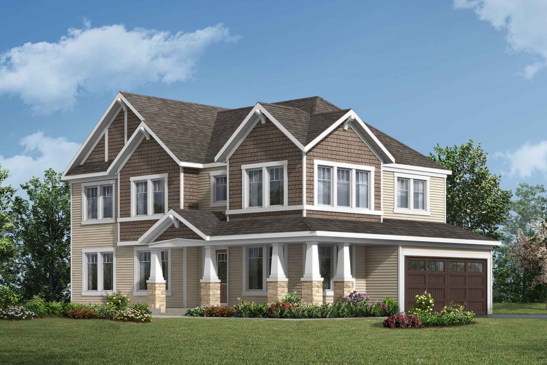 A Craftsman style detached home with a double car garage.