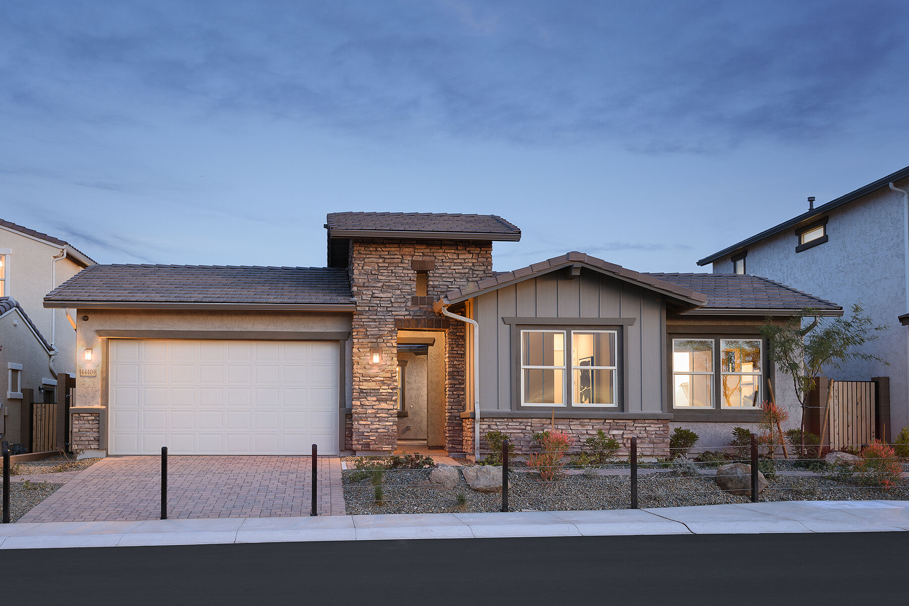  Elevation Front with window, garage and exterior stone