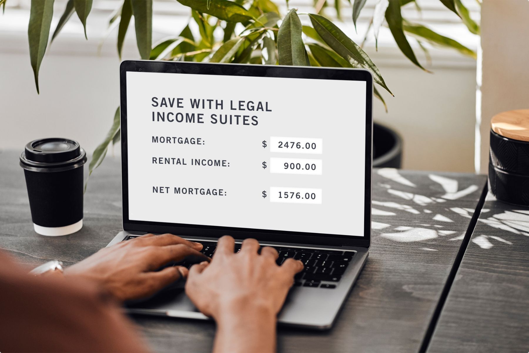 A person on a laptop looking at a legal income suites calculator page.