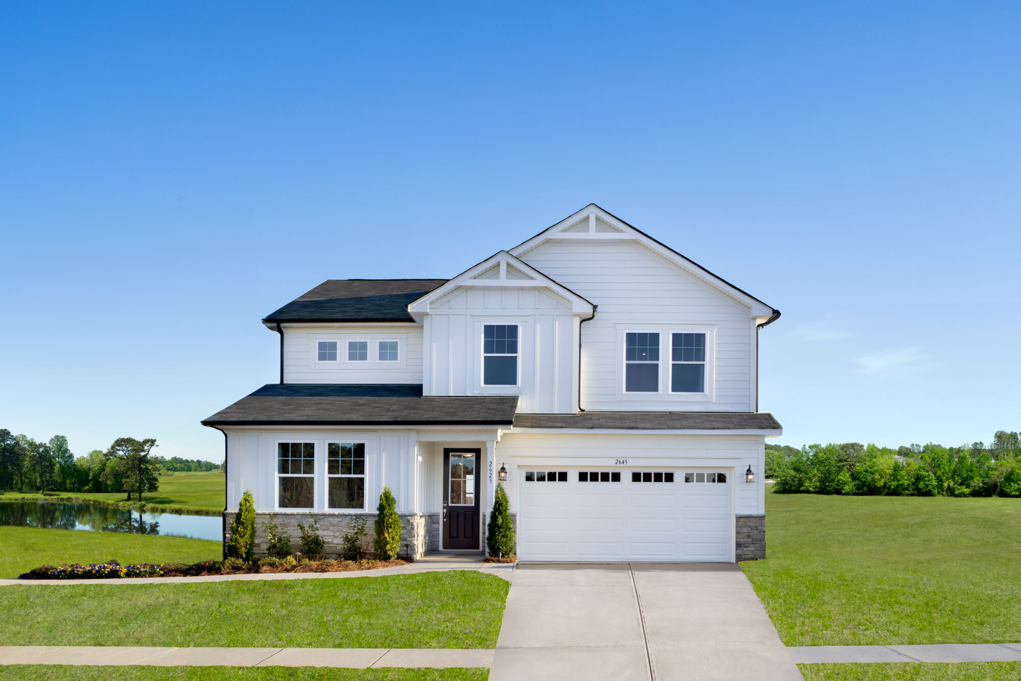  Elevation Front with window, door and garage