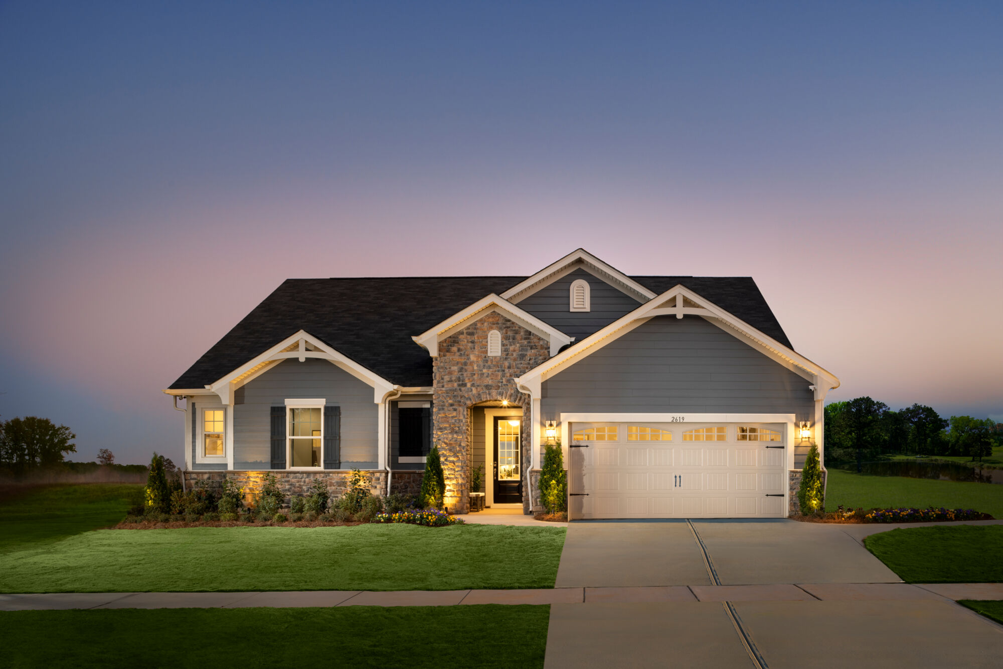  Elevation Front with garage, window, door, exterior clapboard and exterior stone