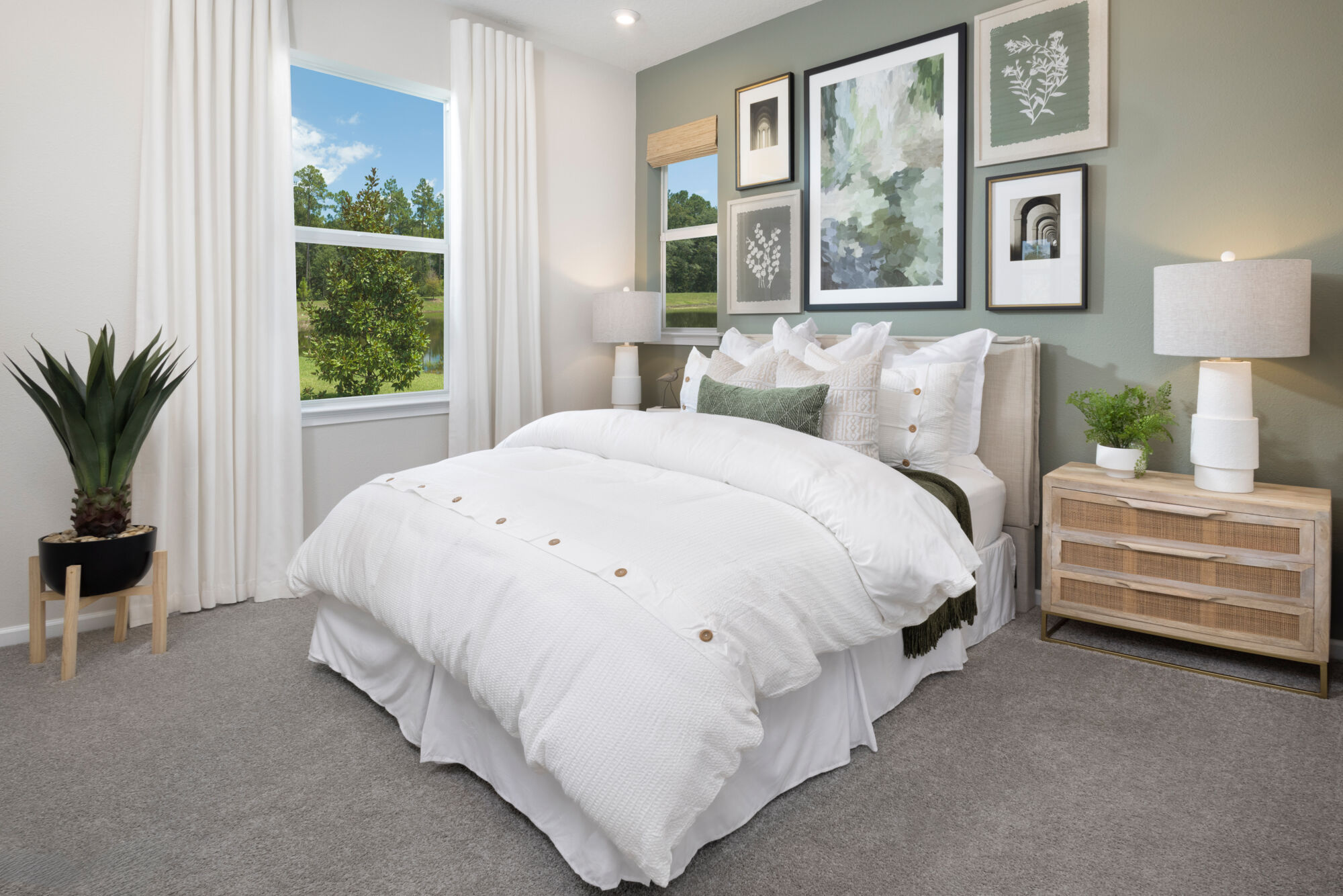  Bedroom with painting, window, curtains and carpet