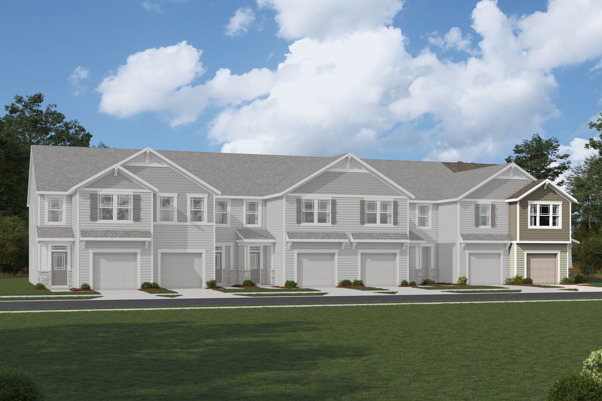  Town Homes with window, garage, door and exterior clapboard